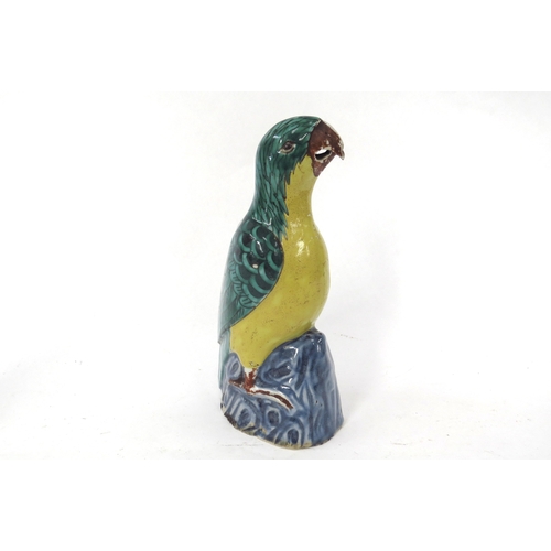 5031 - A late 18/19th Century Chinese  ceramic figure of a parrot, green and yellow glazed 20cm tall