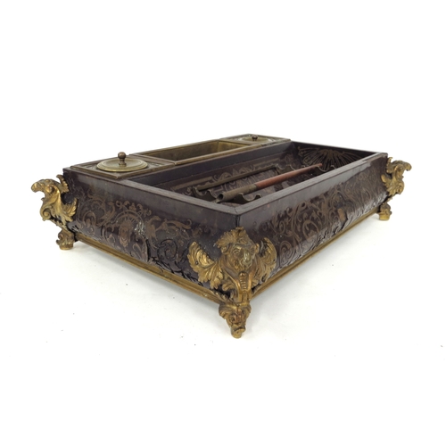 5503 - A 19th Century tortoiseshell Boulle work desk stand with ormolu embellishment, decorated with figure... 