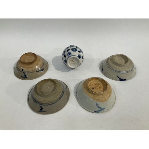 5023 - Four Chinese rice bowls with blue brush marks to body and a blue and white porcelain vase of small p... 