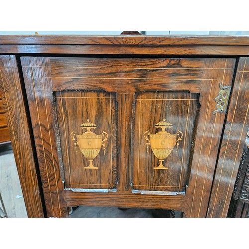 5694 - A late Victorian rosewood cabinet, gallery back over a half glazed single door with urn marquetry pa... 