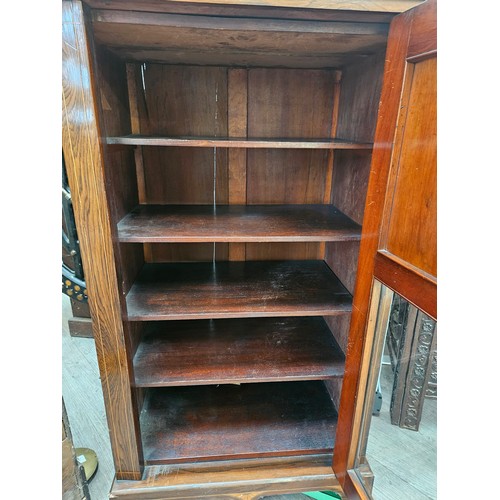 5694 - A late Victorian rosewood cabinet, gallery back over a half glazed single door with urn marquetry pa... 