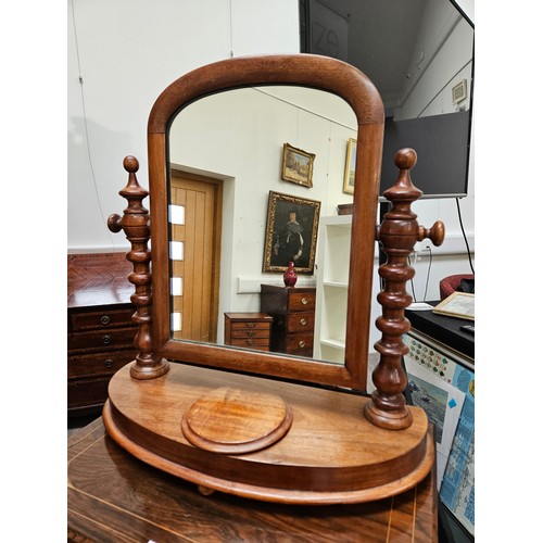 5693 - A Victorian mahogany dressing table mirror with barley twist supports, the bottom with a velvet line... 