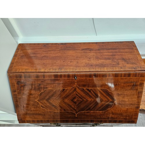 5689 - An Edwardian mahogany bureau with crossbanding and line inlaid decoration, the three drawer interior... 