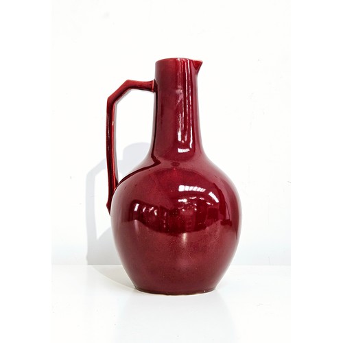 5679 - A Sang de Boeuf ceramic jug 27.5cm tall  (E)  £15-25