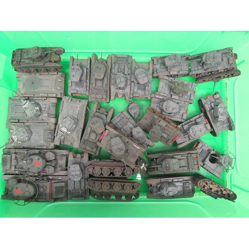 7299 - A collection of plastic kit built model military vehicles including tanks, armoured cars, trucks etc... 