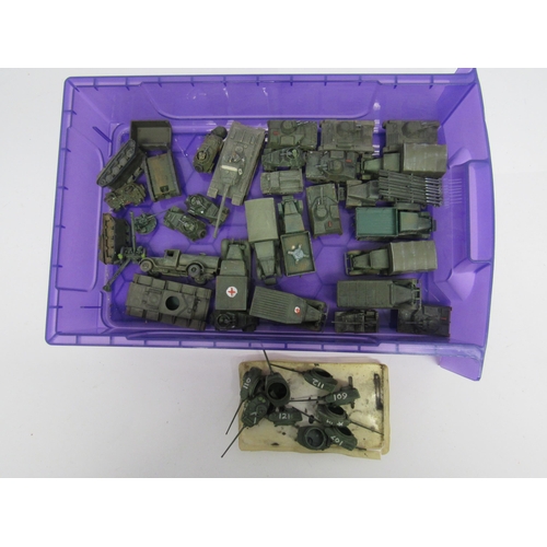 7299 - A collection of plastic kit built model military vehicles including tanks, armoured cars, trucks etc... 