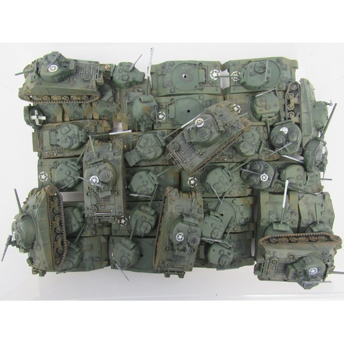 7300A - A collection of plastic kit built model military vehicles including tanks, half-tracks, covered wago... 