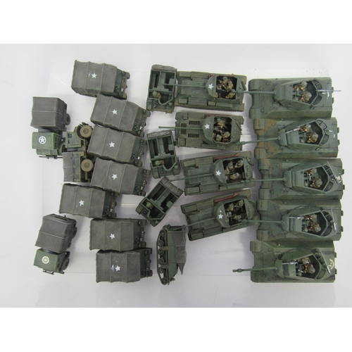 7300A - A collection of plastic kit built model military vehicles including tanks, half-tracks, covered wago... 