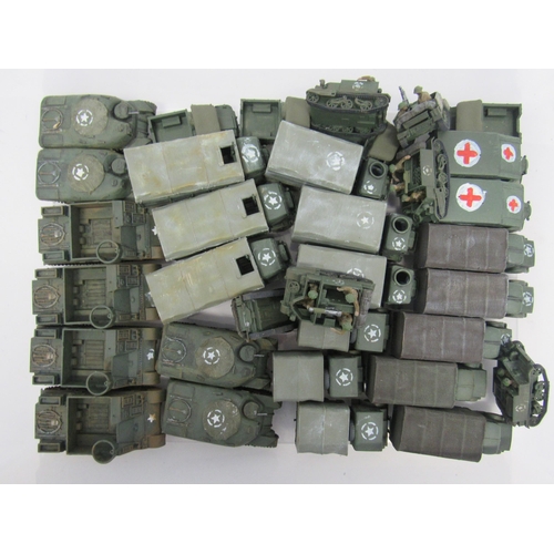 7300A - A collection of plastic kit built model military vehicles including tanks, half-tracks, covered wago... 