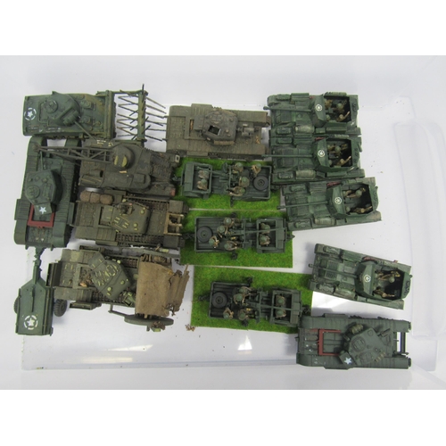 7294 - A collection of plastic kit built model military vehicles including tanks, half-tracks, armoured car... 