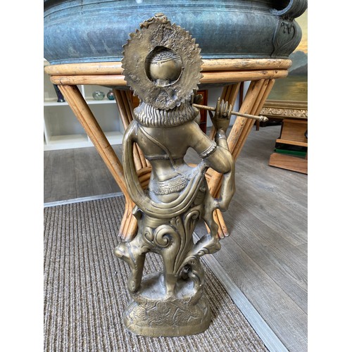 5038A - A large temple cast brass figure of Krishna, 74cm tall  (R)  £250