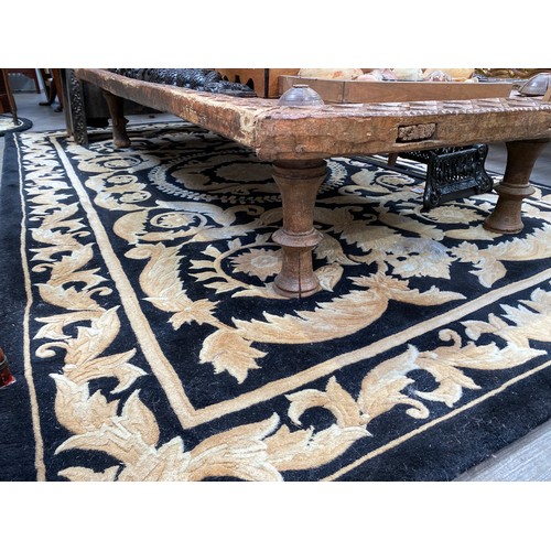 5698 - A G H FRITH Ltd, hand made Oriental carpet, black ground with all-over acanthus scrolling detail 242... 