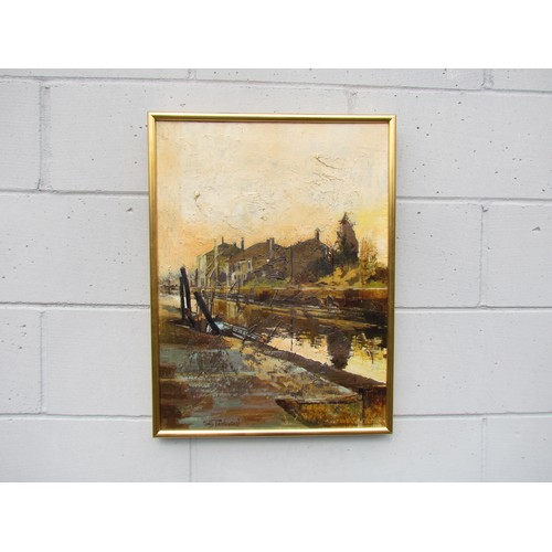 7515 - SALLY TOMLINSON (XX) A framed oil on canvas, canal scene with cottages. Signed bottom left. Image si... 