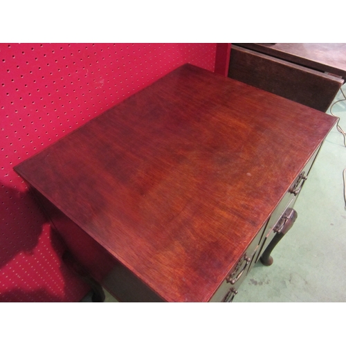 4016 - A Georgian style mahogany chest of four drawers over pad foot cabriole legs with shell carved decora... 