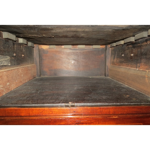 4028 - A George III mahogany nightstand, the two doors with line inlay decoration and single base drawer on... 