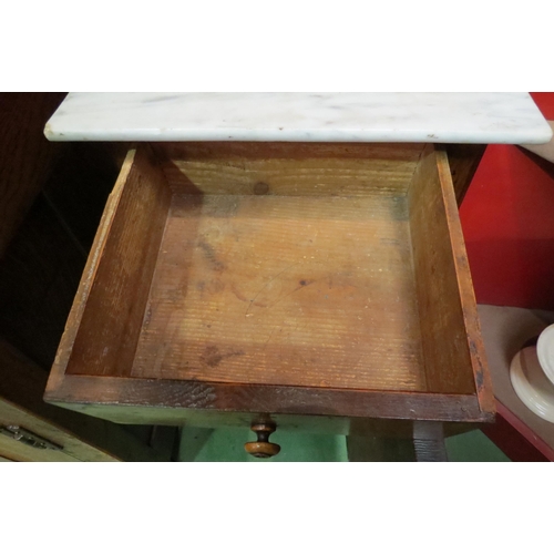 4046 - A Victorian French walnut bedside cabinet, the marble top over a single drawer and cupboard on a pli... 