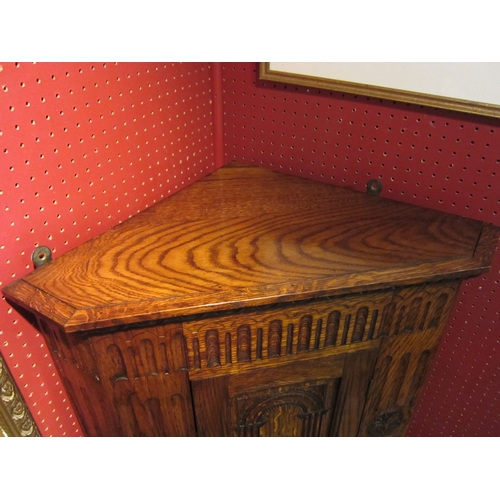 4048 - A corner cupboard of small proportions, dated 