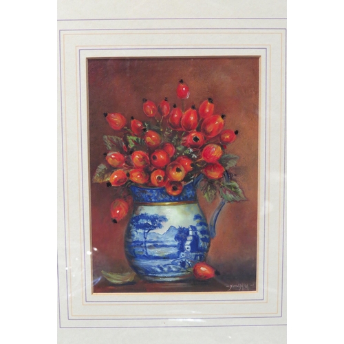 4054 - JAMES J. ALLEN: A coloured print with overpainting depicting rosehips in a blue and white jug, frame... 
