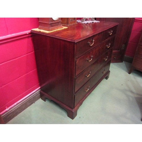 4129 - A George III flame mahogany chest of two short over three graduating long drawers having brass swan ... 