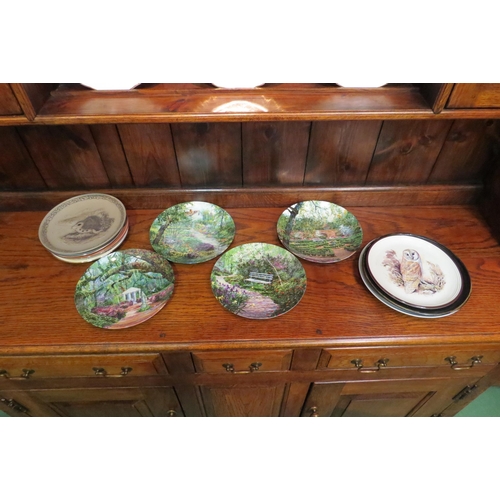 4331 - Four Bradex collectors plates depicting garden scenes and eight further plates. Seven Wedgwood colle... 