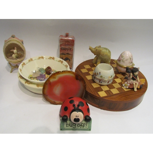 4341 - A box of miscellaneous including treen travel chess set, Royal Doulton 'Bunnykins' bowls and tourist... 