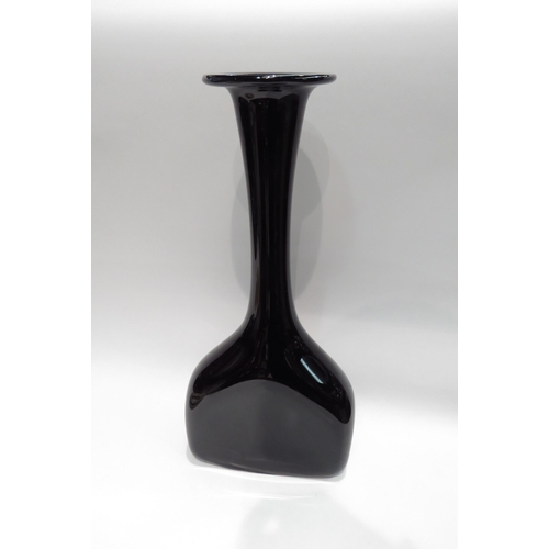 4345 - A large black glass vase with slender neck to flared rim, 45cm tall