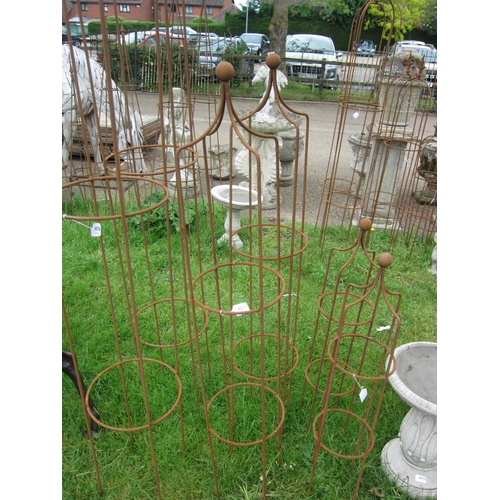 6077 - A pair of steel ball top obelisks