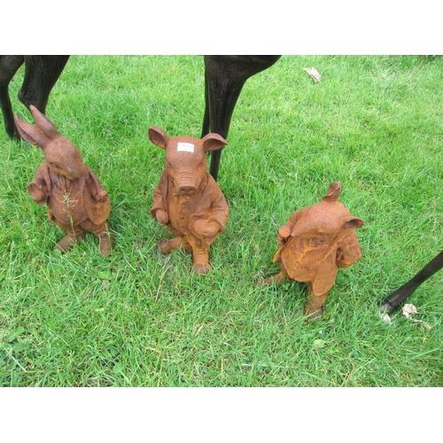 6080 - Three cast iron garden figures; rat, pig and rabbit, each figure approx 17