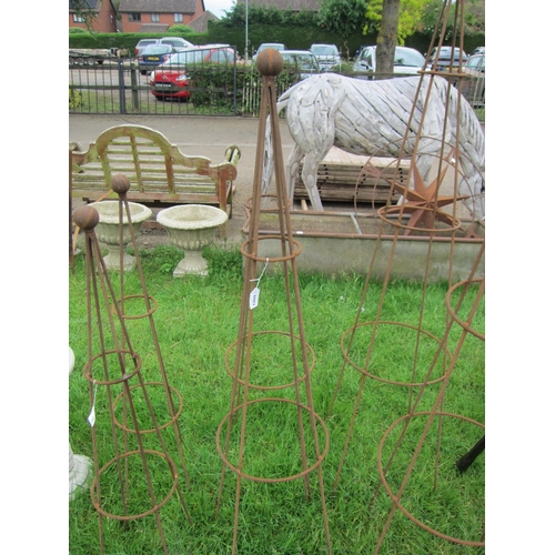 6082 - A pair of steel ball top obelisks