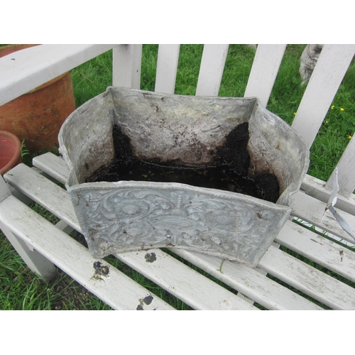 6105 - A pair of 19th Century lead planters with highly ornate acanthus floral detail, 22cm x 45cm x 32cm