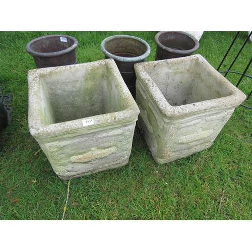 6134 - Two heavy square form planters with raised urn detail, 40cm x 40cm x 40cm