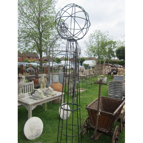 6135 - A large ball obelisk, approx 8ft tall    (R)