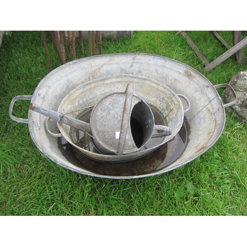 6145 - Two galvanised baths and a watering can