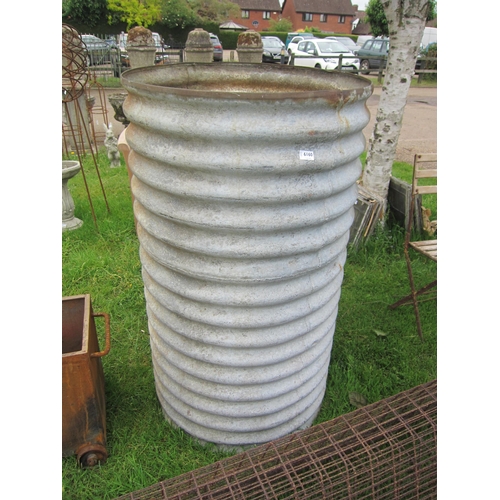 6160 - A corrugated water tank with tap, 49.5