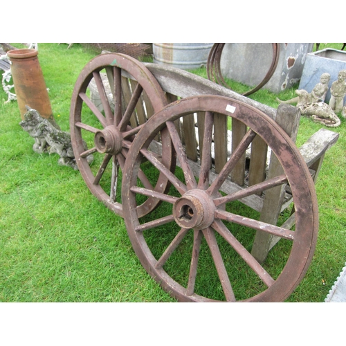 6170 - A pair of wooden cart wheels with iron rims, 39