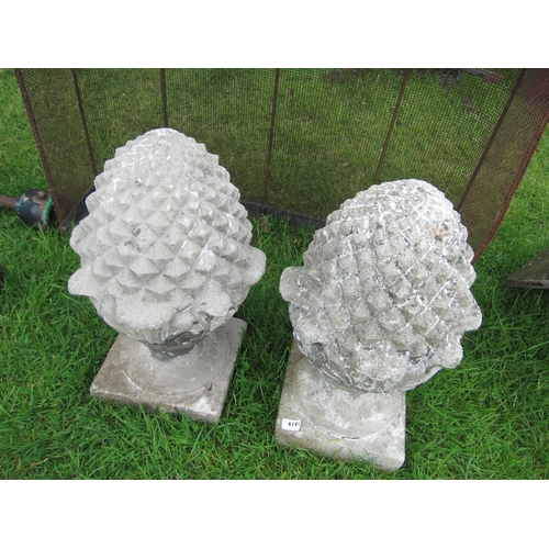 6191 - A pair of reconstituted pineapple finials, approx 22