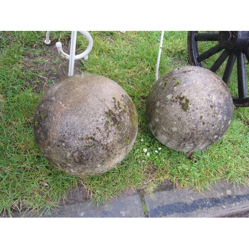 6569A - A pair of weathered balls, 12