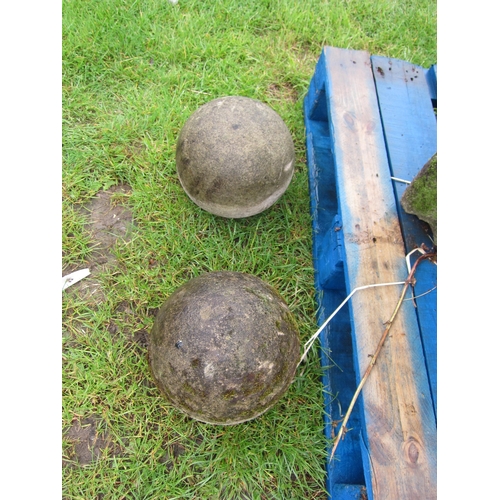 6572 - A pair of weathered balls, 9