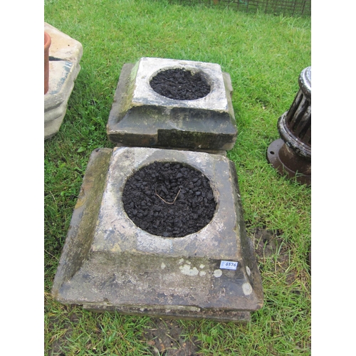 6576 - A pair of shaped stone planters