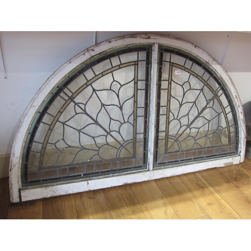 6591 - A pine framed leaded glass fanlight window, 66.5