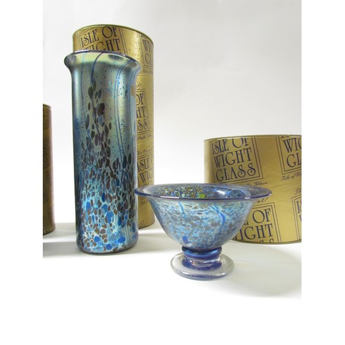 7238 - Three pieces of Isle of Wight iridescent glass in Summer Fruits pattern, two cylindrical vases at 22... 