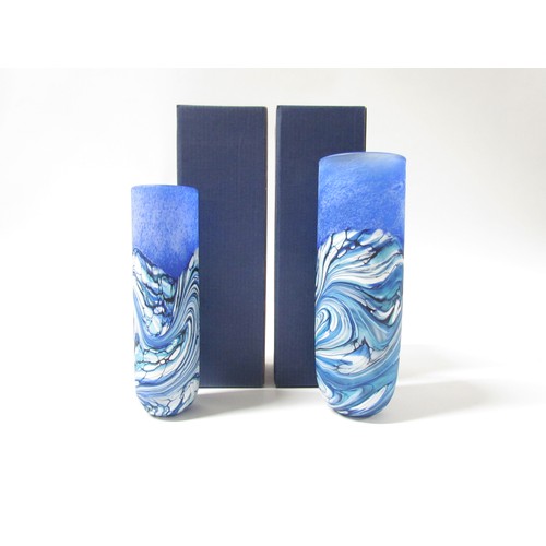 7240 - Two Isle of Wight glass cylindrical vases in Blue Wave pattern, 18cm and 16cm. Each with original bo... 