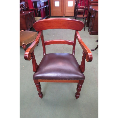 4002 - A Victorian style walnut desk armchair with scroll arms over turned and tapering fore legs  (R)  £25