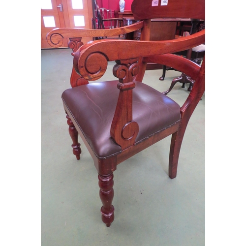 4002 - A Victorian style walnut desk armchair with scroll arms over turned and tapering fore legs  (R)  £25