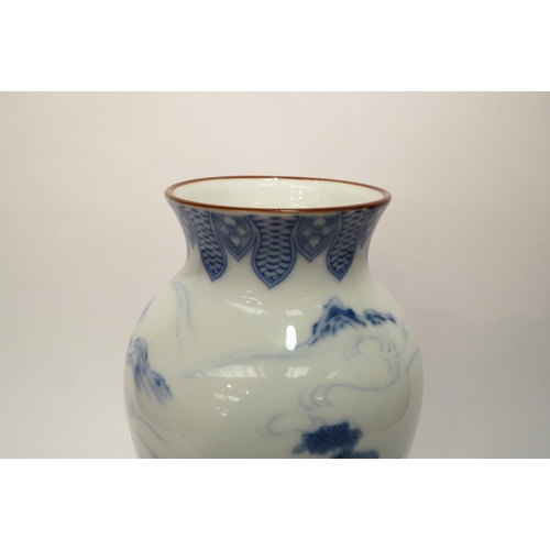 4023 - A 20th Century Japanese Shibata blue and white vase with landscape scene, 29.5cm tall  (E)  £15-20