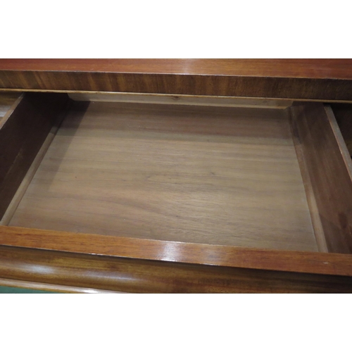 4026 - A Circa 1860 mahogany chiffonier, the raised back over carved corbels and two cushion frieze drawers... 