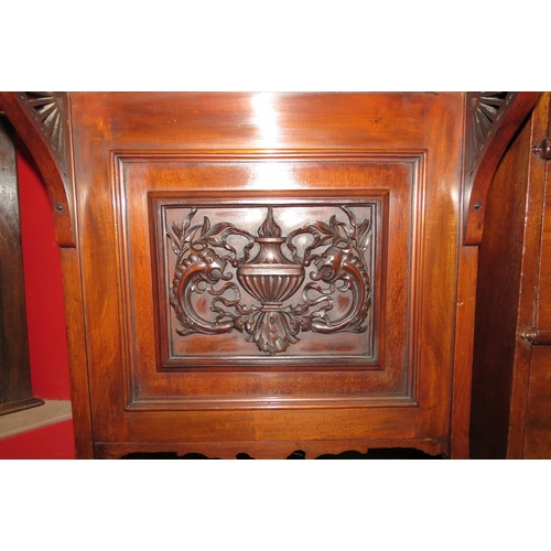 4052 - A Circa 1900 mahogany Davenport, the raised top with fitted interior and key over a rising tooled le... 