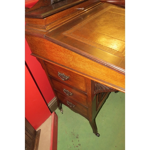 4052 - A Circa 1900 mahogany Davenport, the raised top with fitted interior and key over a rising tooled le... 