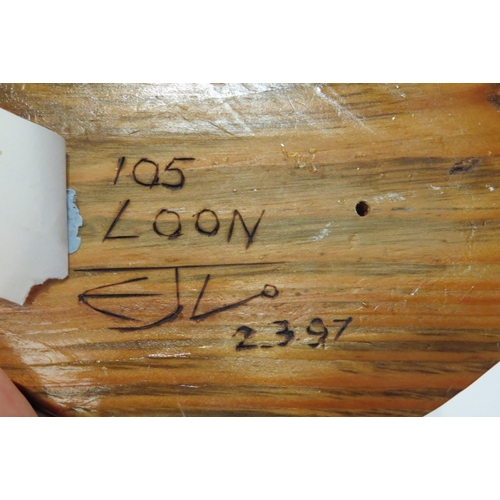 4058 - A carved Great Northern Diver (Loon) by Edward Lovesey 2/3/97, marked to base, 27cm long