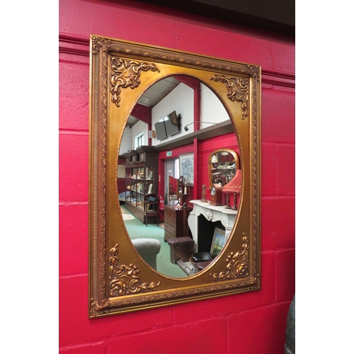4126 - A Georgian style rectangular ornate gilt frame oval mirror, 91cm x 66cm total  (R)  £45